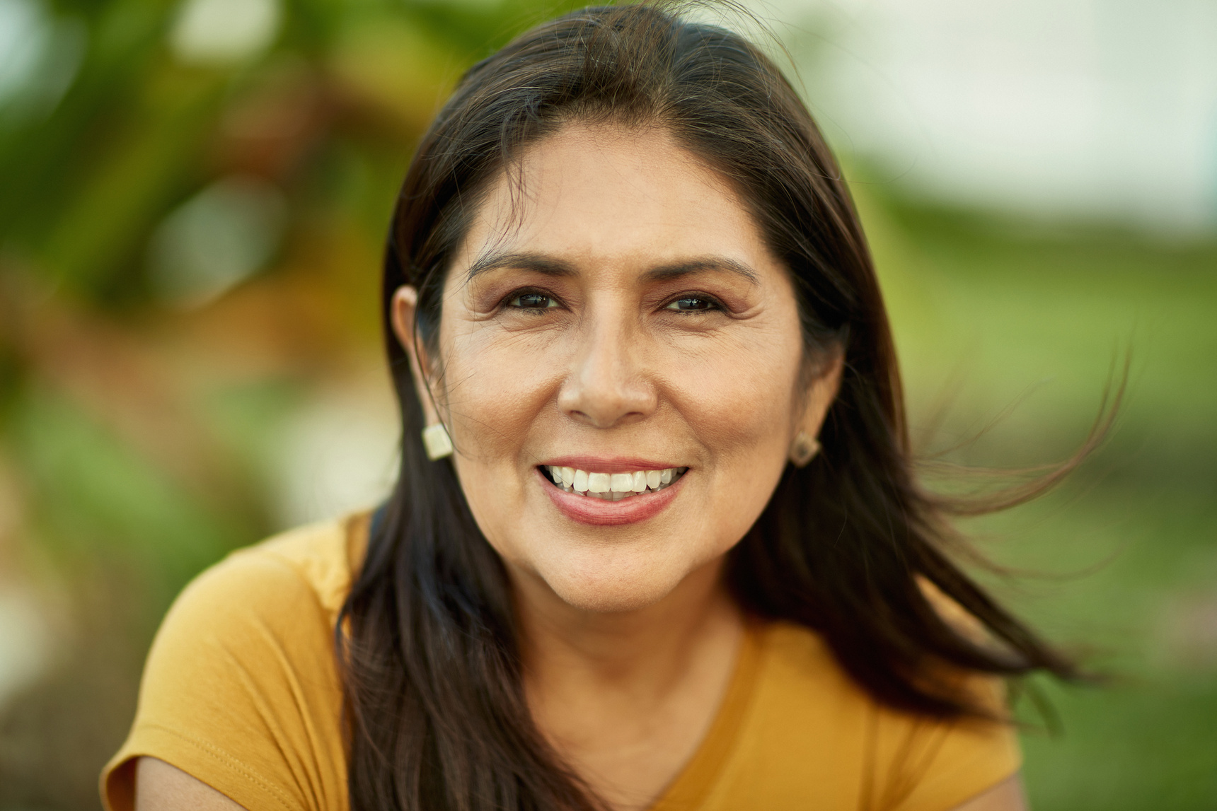 Portrait of Cheerful 50 Year Old Hispanic Woman